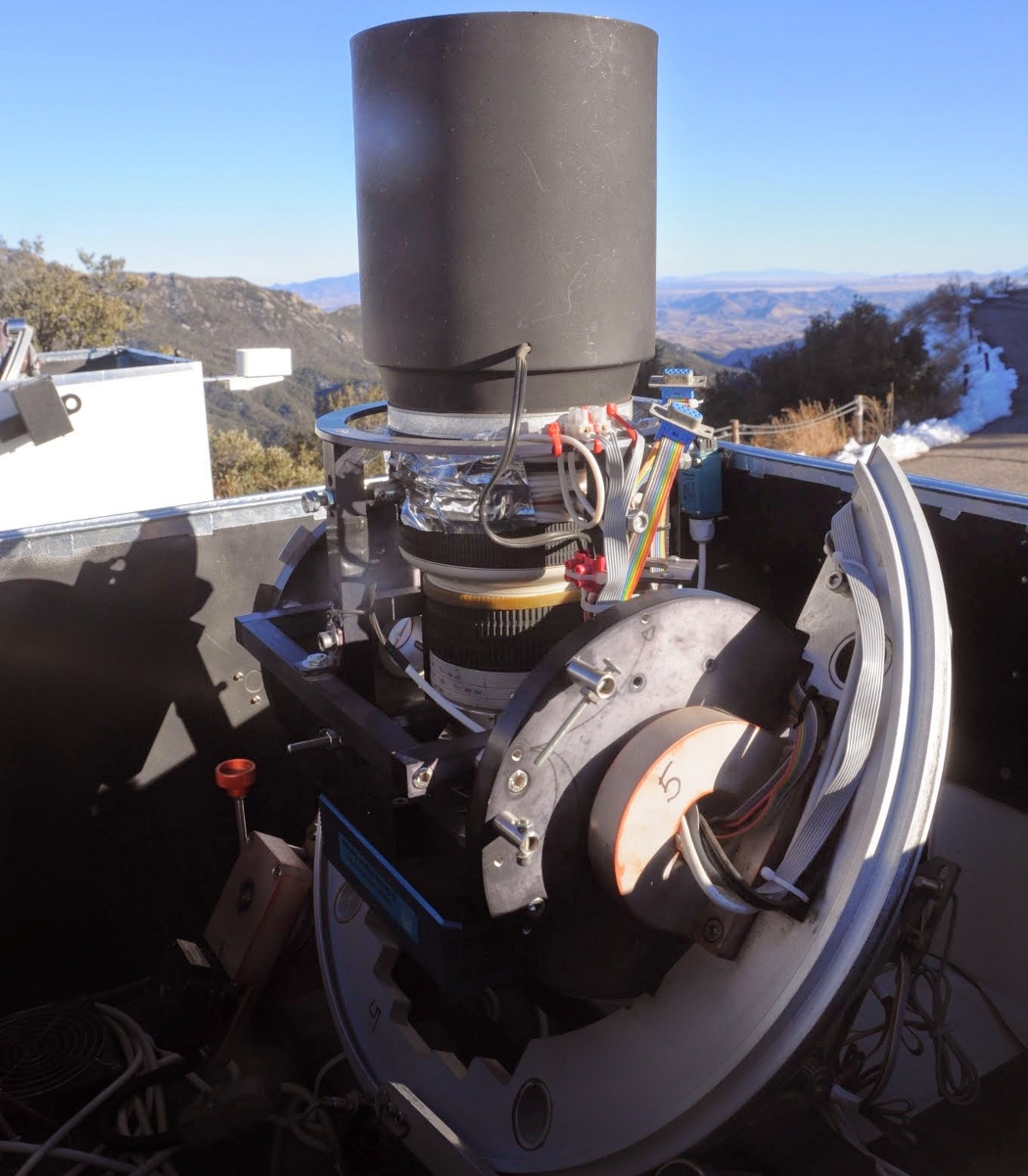 Closeup of HATNet telescope system, showing details of lens
               and camera